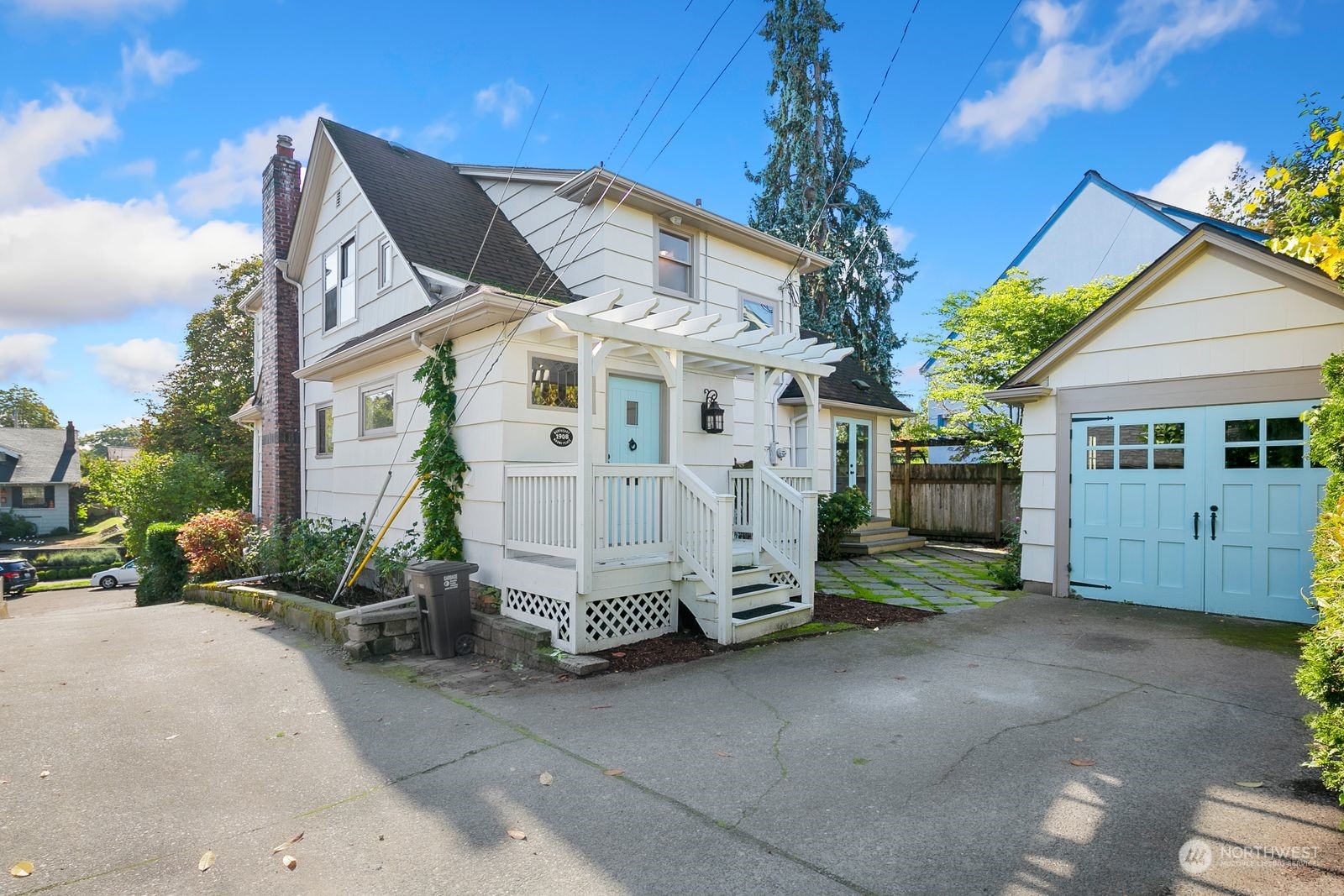 1908 Northeast Naomi Place Seattle, WA 98115 - Photo 29 of 30 a view of a house with a yard