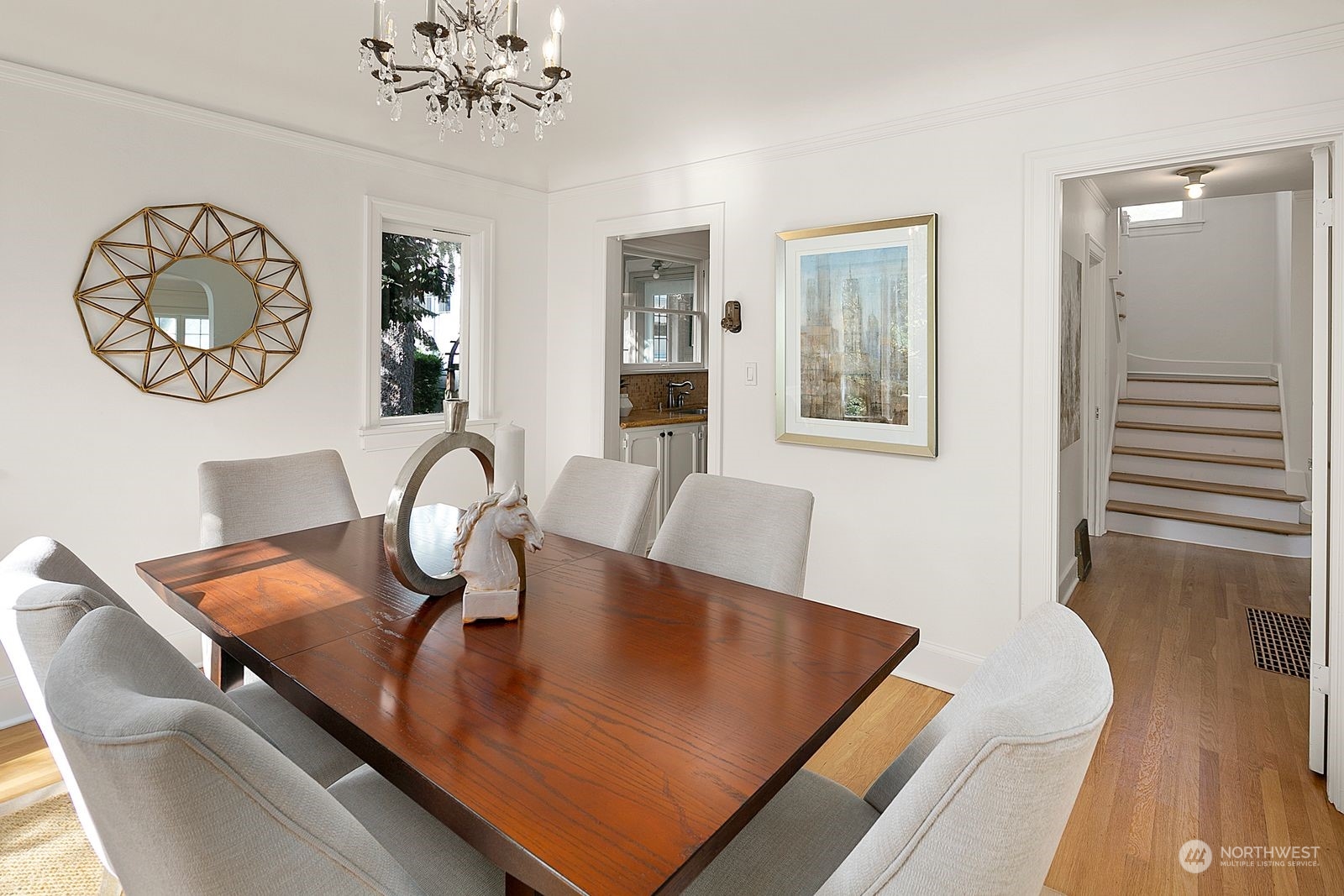 1908 Northeast Naomi Place Seattle, WA 98115 - Photo 9 of 30 a view of a dining room with furniture and wooden floor