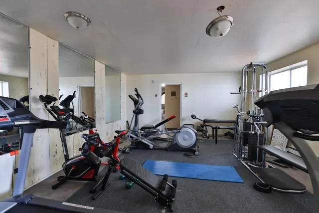 a view of a room with gym equipment
