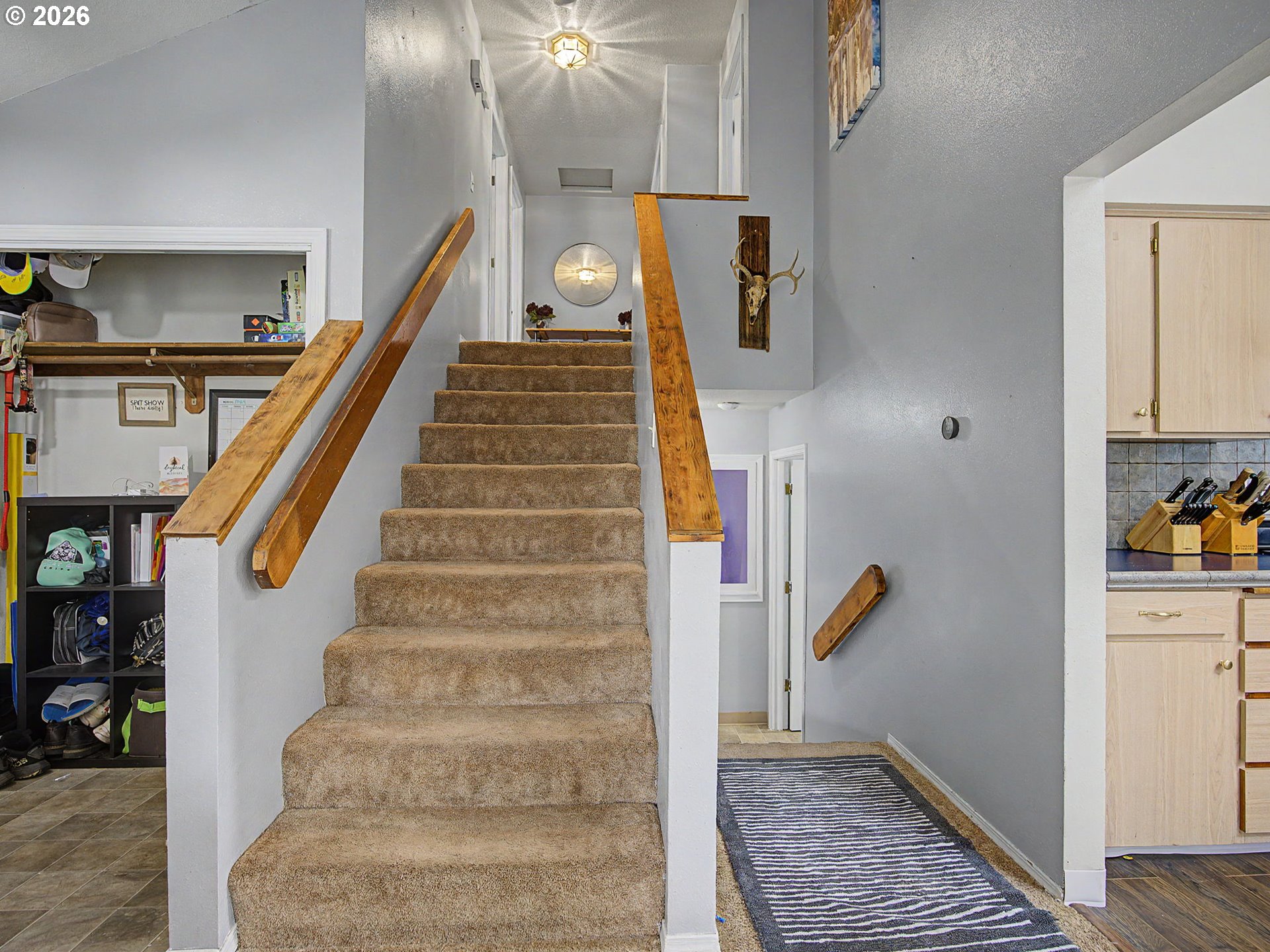 18015 Davis Street Sandy, OR 97055 - Photo 16 of 40 a view of staircase with white walls and stairs