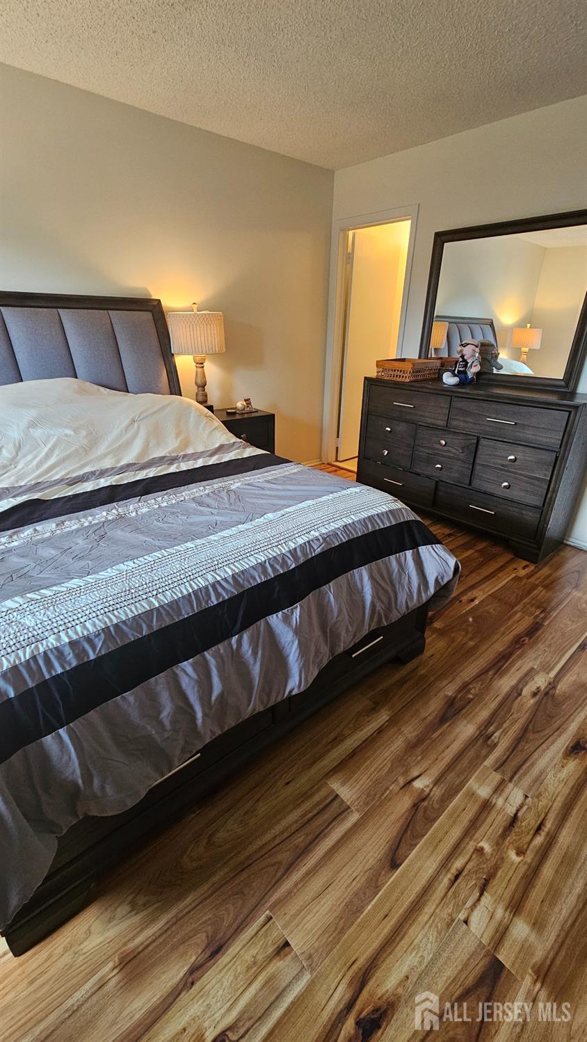 449 B Closter Road, Unit B Monroe Township, NJ 08831 - Photo 7 of 14 a bedroom with a bed and window
