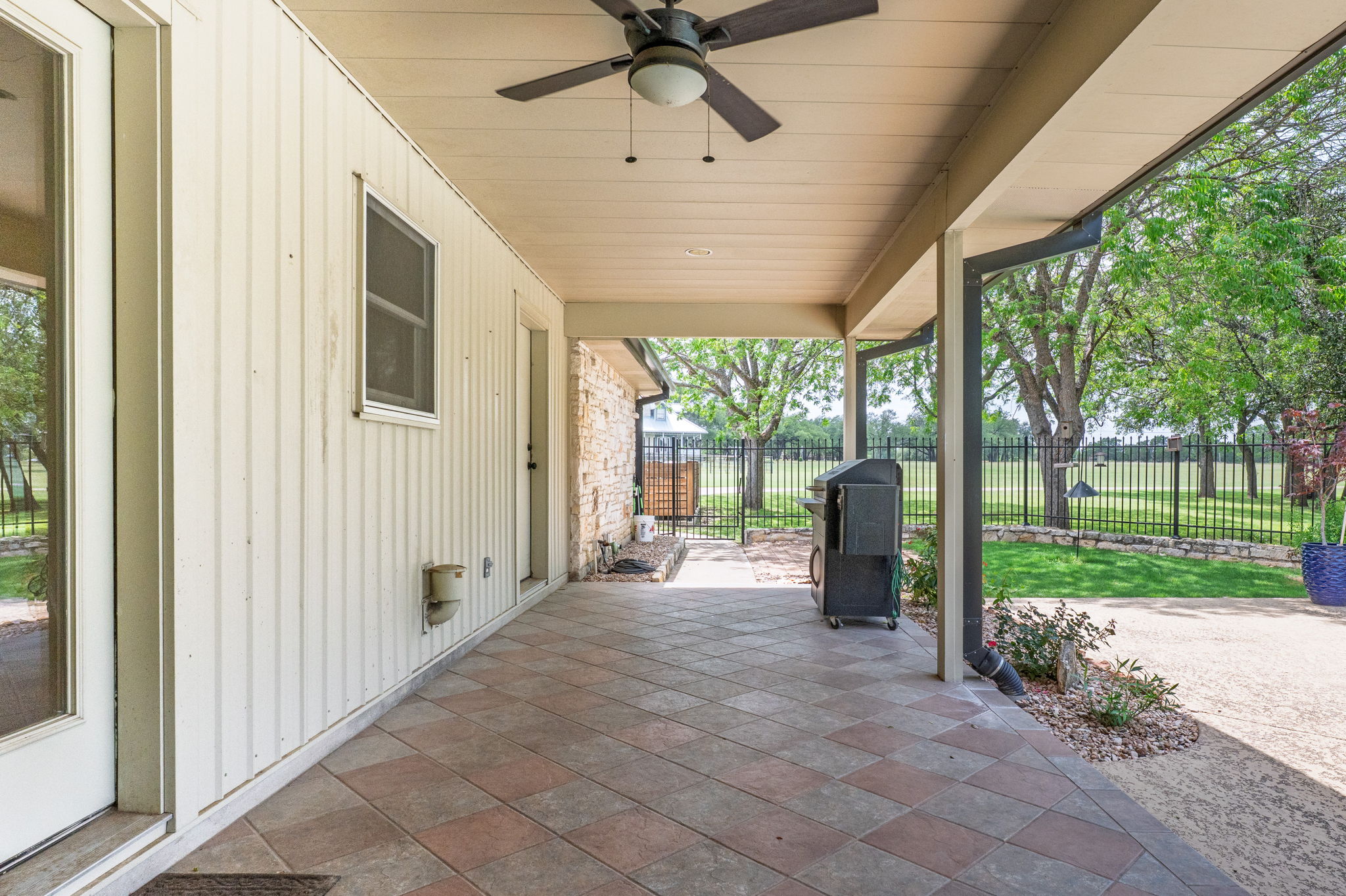 320 Greenridge Road Georgetown, TX 78628 - Photo 26 of 38 a view of a porch with furniture and backyard