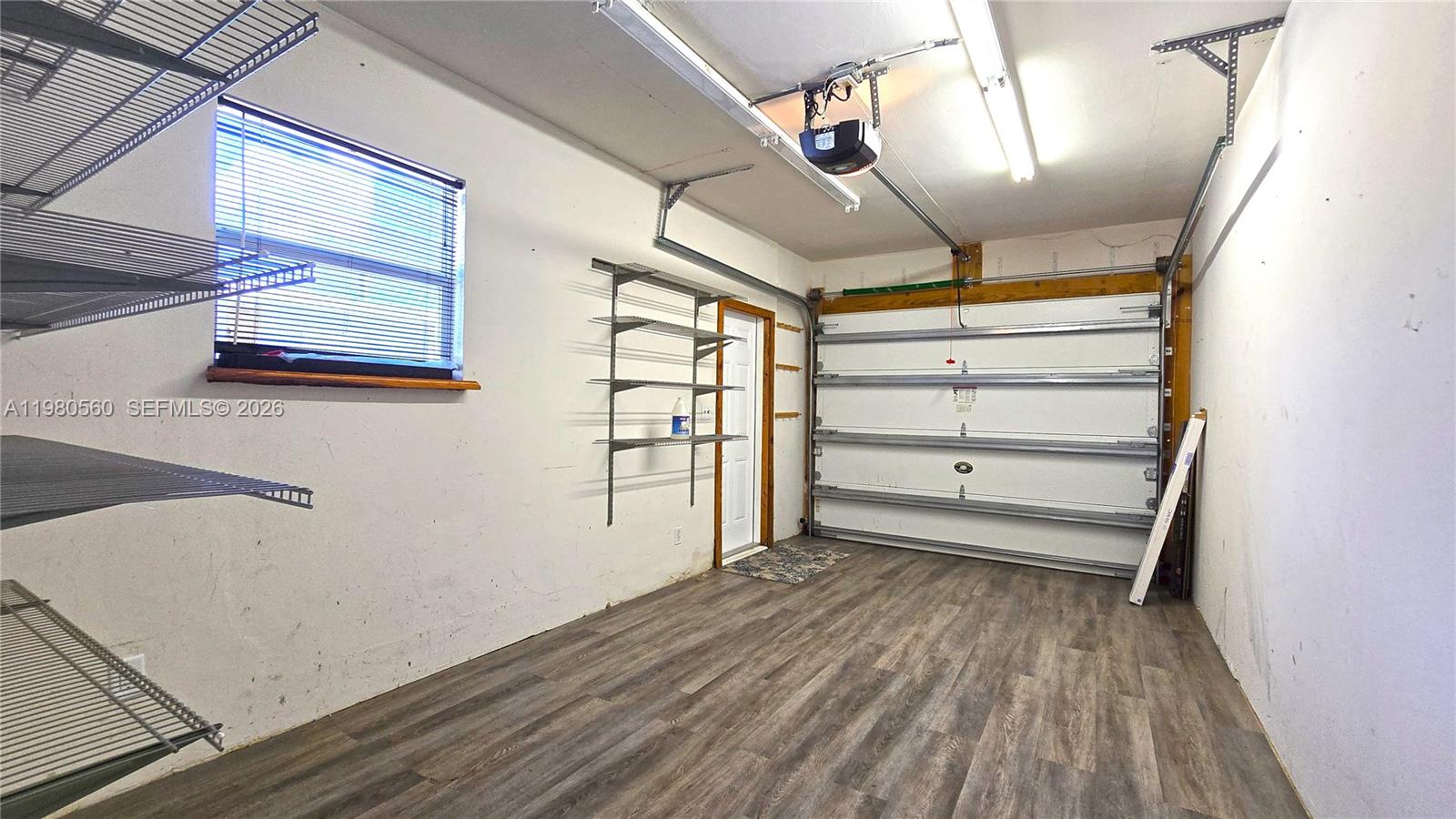 909 Southwest 9th Avenue Boca Raton, FL 33486 - Photo 13 of 18 a view of empty room with wooden floor