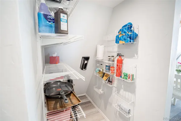 a view of living room with furniture and flowers