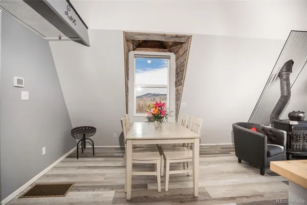 a view of livingroom with furniture and wooden floor
