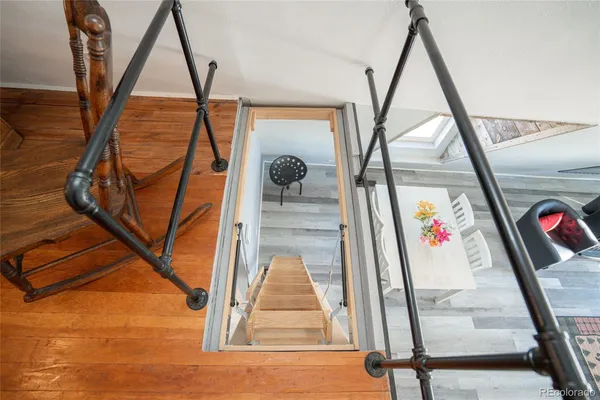 a bedroom with a bed and a mirror