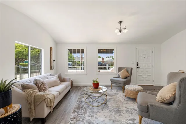 a living room with furniture or couch and a window