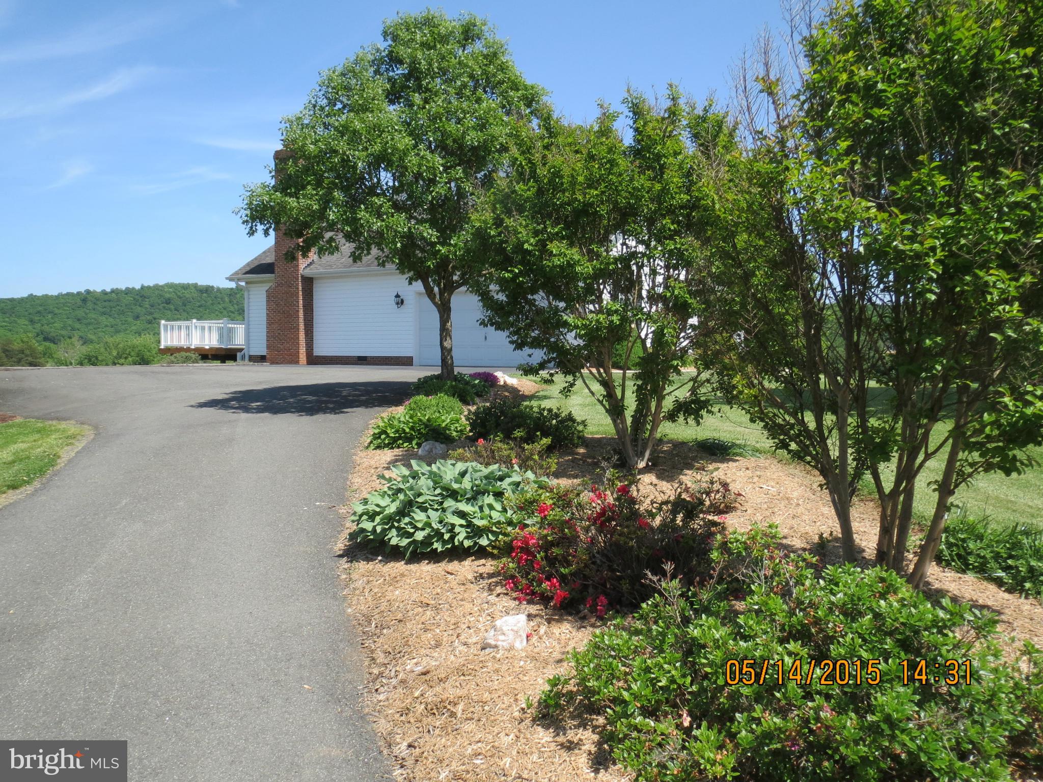 9620 Ridge View Drive Marshall, VA 20115 - Photo 3 of 30 Landscaping on Paved Driveway to Home