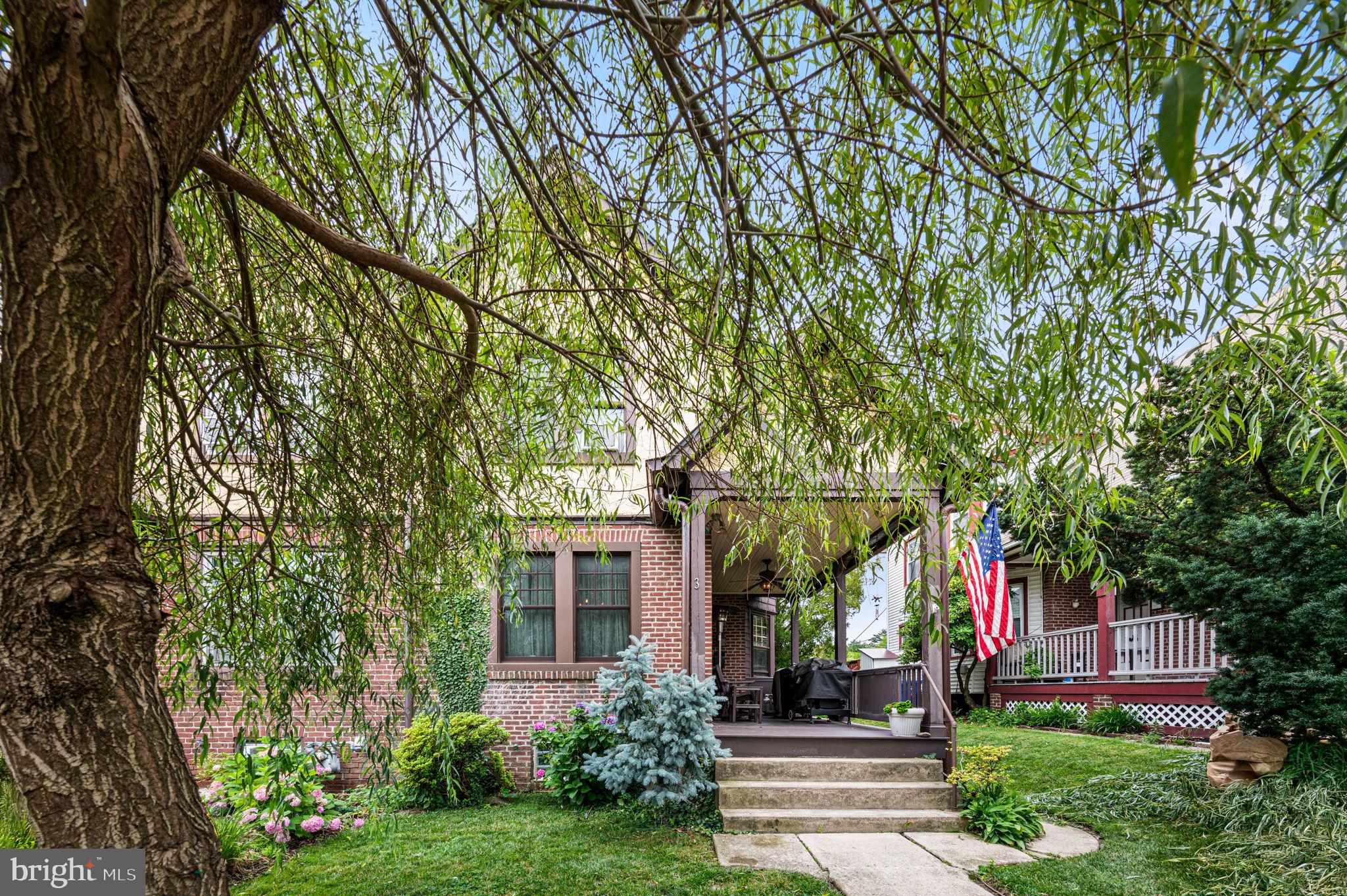 3 Township Line Road Elkins Park, PA 19027 - Photo 1 of 40 Charming home with lush greenery.