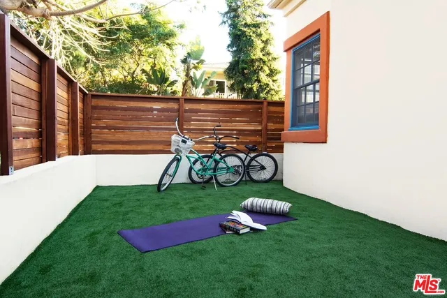 a view of yard with seating area and furniture