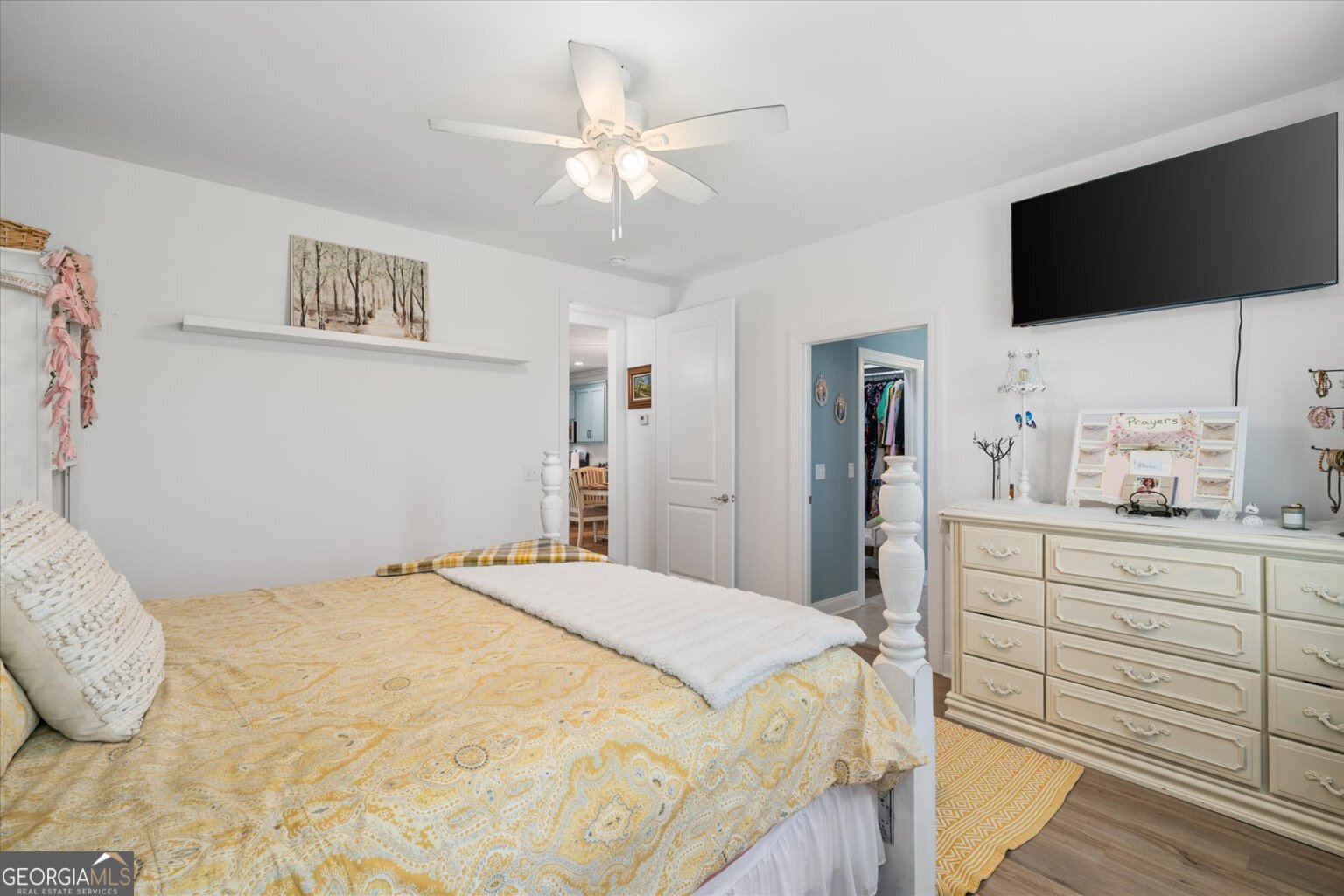 383 Pacer Lane, Unit 3 Dalton, GA 30721 - Photo 29 of 50 a spacious bedroom with a bed and a flat screen tv