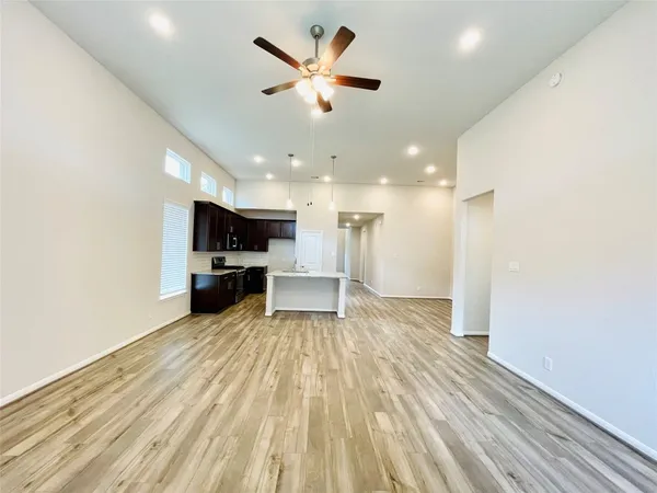 a view of kitchen with a sink and a kitchen view