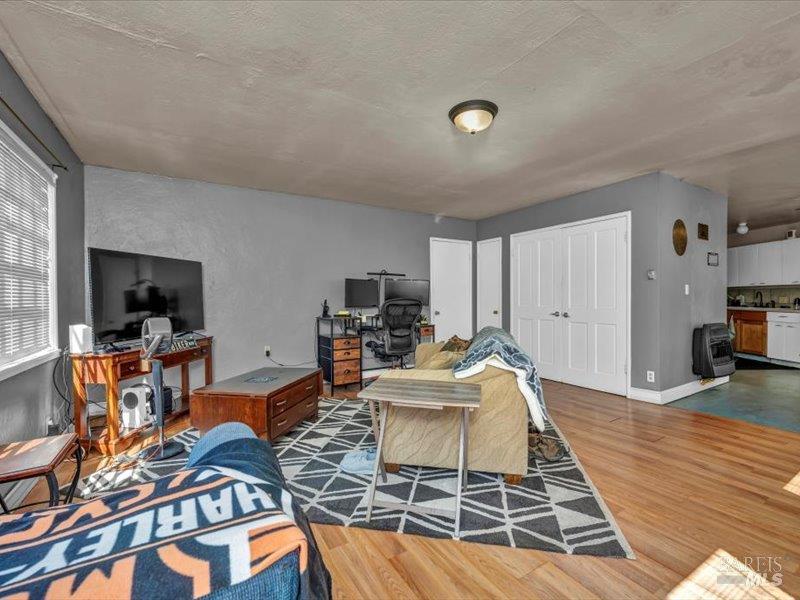 315 White Cottage Road North Angwin, CA 94508 - Photo 22 of 36 a living room with furniture and a flat screen tv