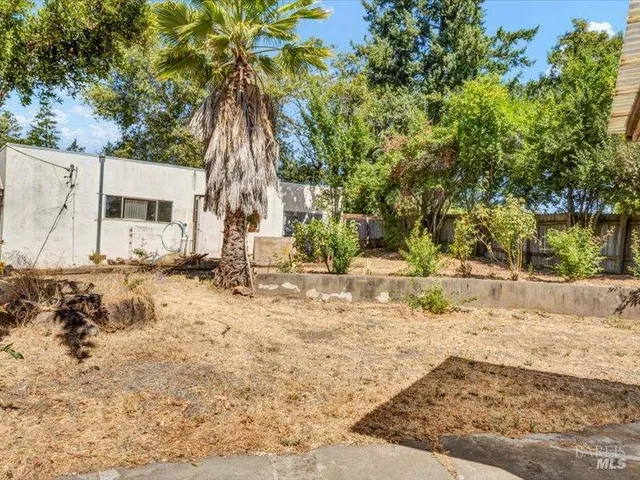 a view of a yard covered with snow
