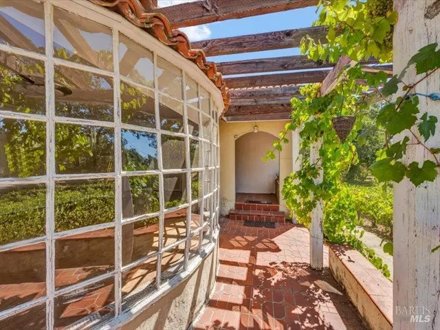 a view of a house with a large window