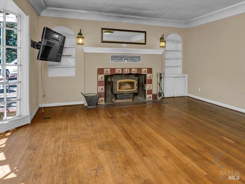 315 White Cottage Road North Angwin, CA 94508 - Photo 10 of 36 an empty room with windows and fireplace