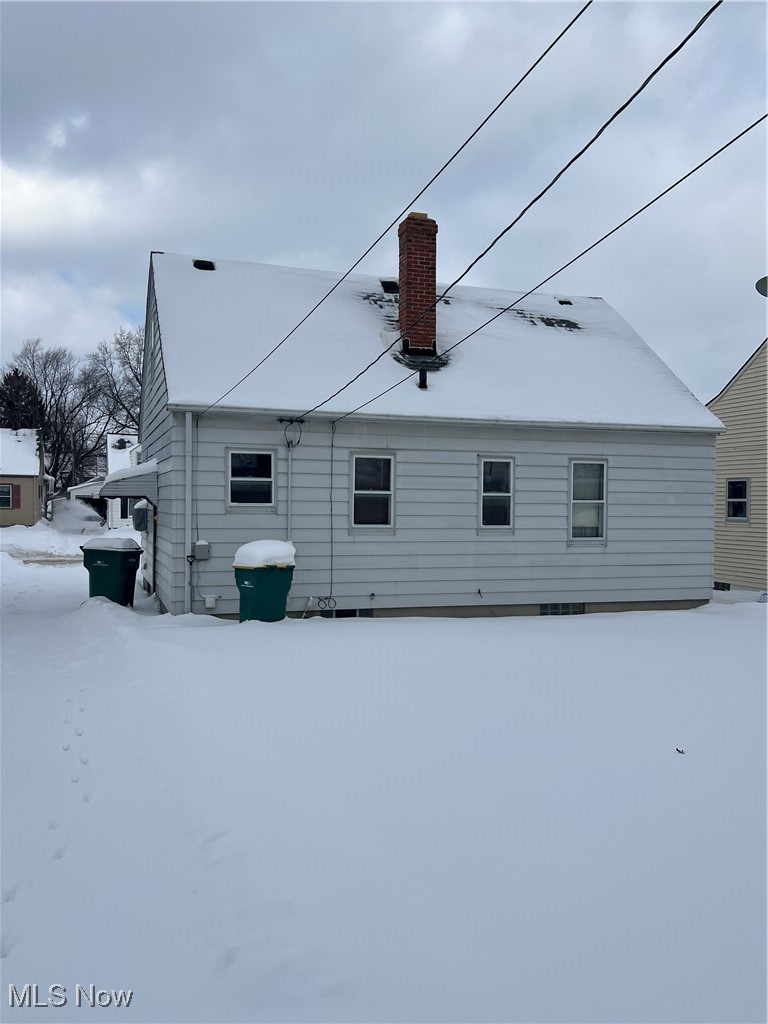 21600 Franklin Road Maple Heights, OH 44137 - Photo 2 of 14 Snow covered property with a chimney