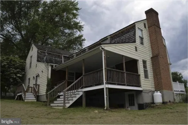 a view of a house with a large window