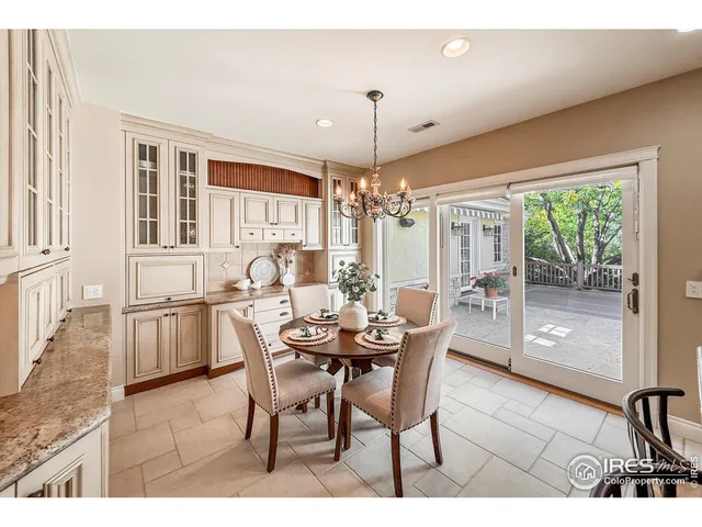 a kitchen with a sink stainless steel appliances and cabinets