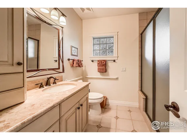 a view of a balcony with wooden floor