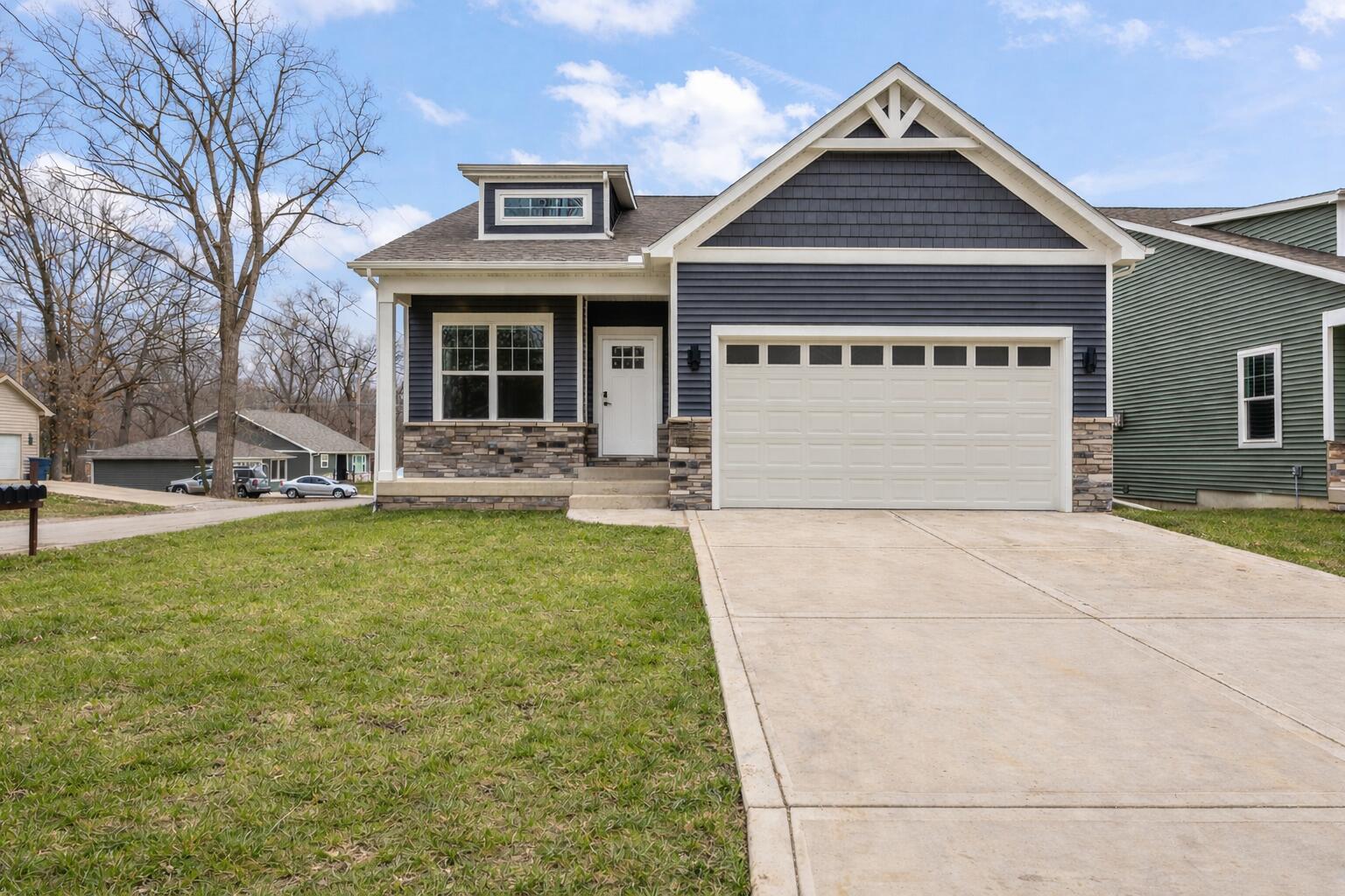 1504 Waverly Road Porter, IN 46304 - Photo 2 of 25 a front view of a house with garden