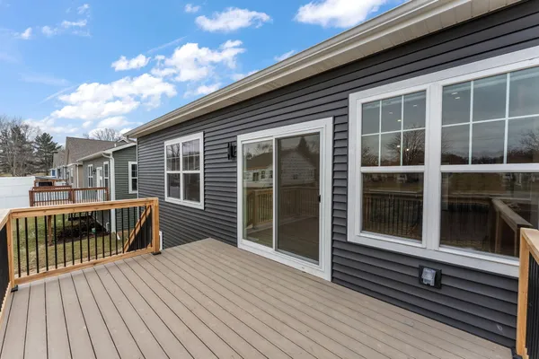 a view of a deck with a yard