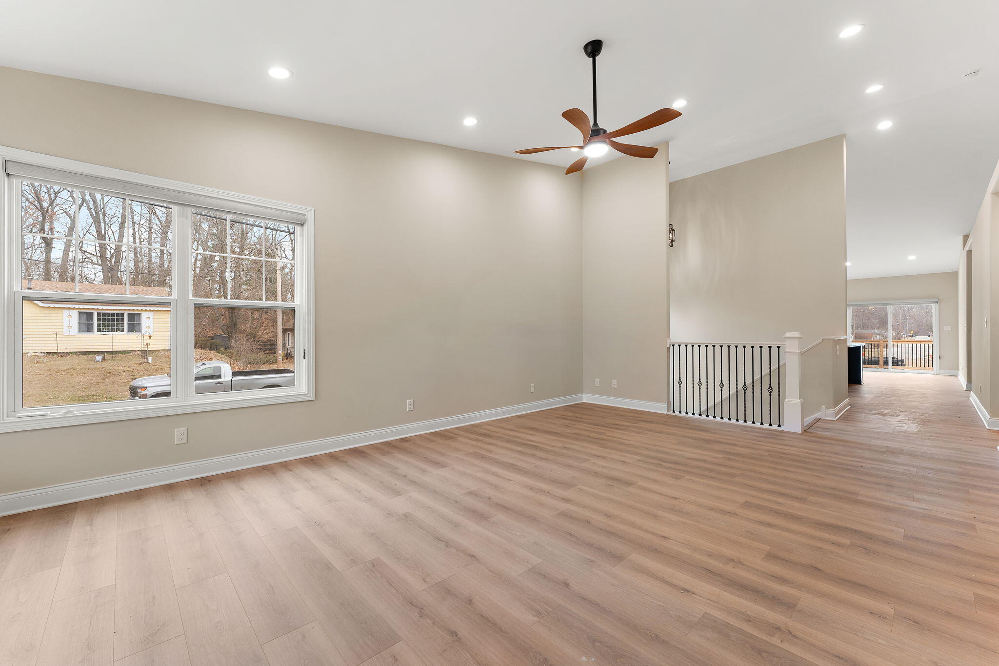 1504 Waverly Road Porter, IN 46304 - Photo 3 of 25 a view of an empty room with wooden floor and a window
