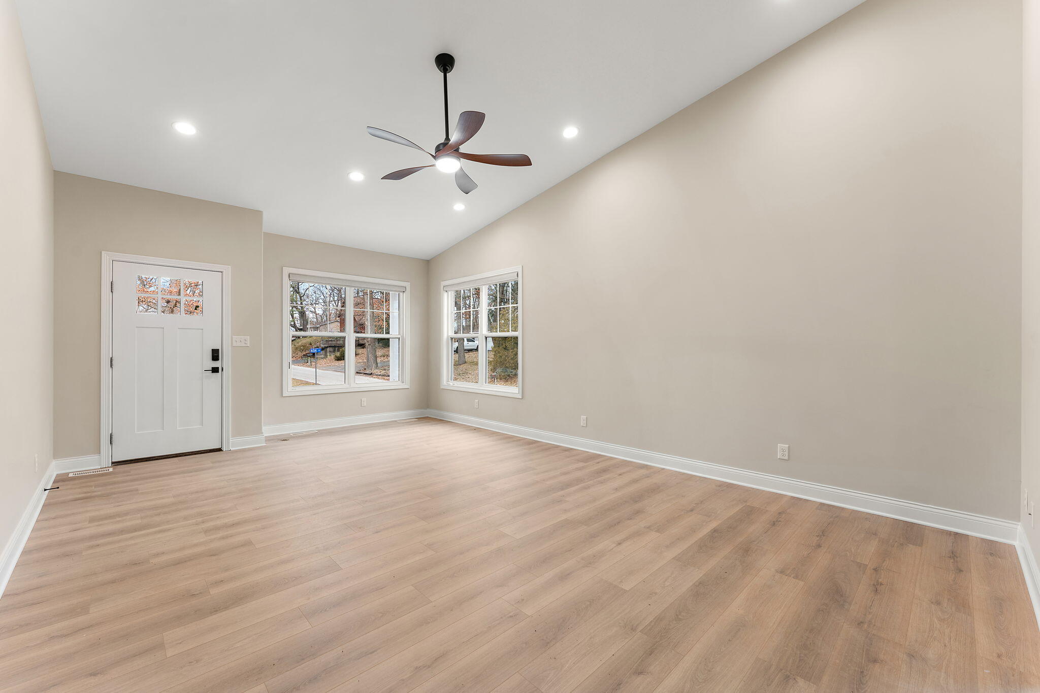 1504 Waverly Road Porter, IN 46304 - Photo 4 of 25 wooden floor in an empty room with a window