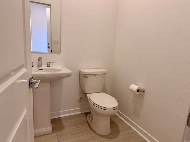 a view of storage and utility room with washer and dryer