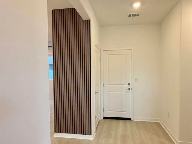 a kitchen with a sink a stove a refrigerator and cabinets