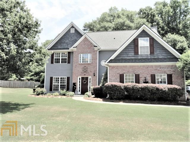 63 Red Tail Road, Unit 74 Jefferson, GA 30549 - Photo 1 of 1 a front view of a house with a yard