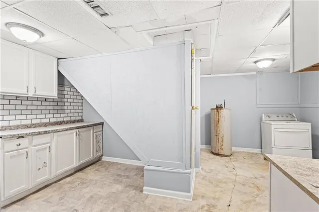 a view of a storage & utility room with washer and dryer