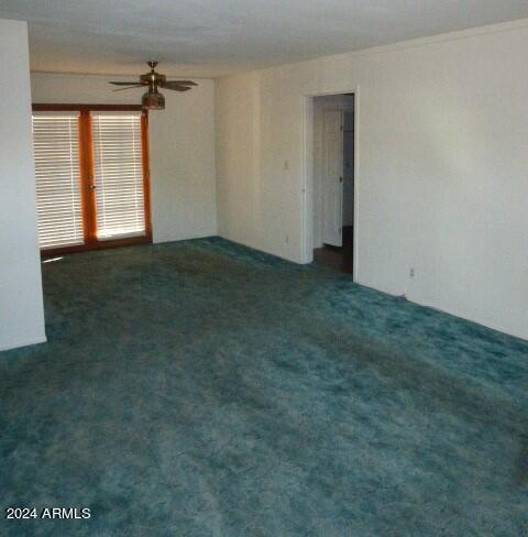 301 Fairhaven Road Kearny, AZ 85137 - Photo 6 of 35 an empty room with windows