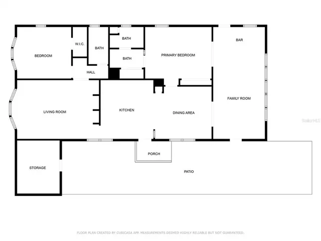a view of a porch with furniture and floor to ceiling window