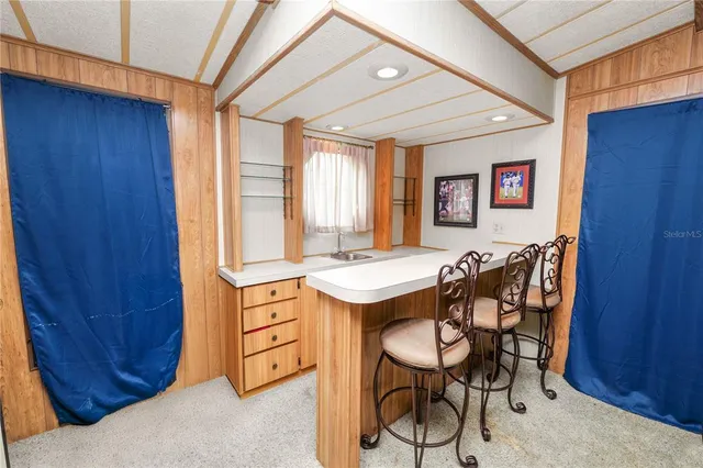 a view of a house with entertaining space