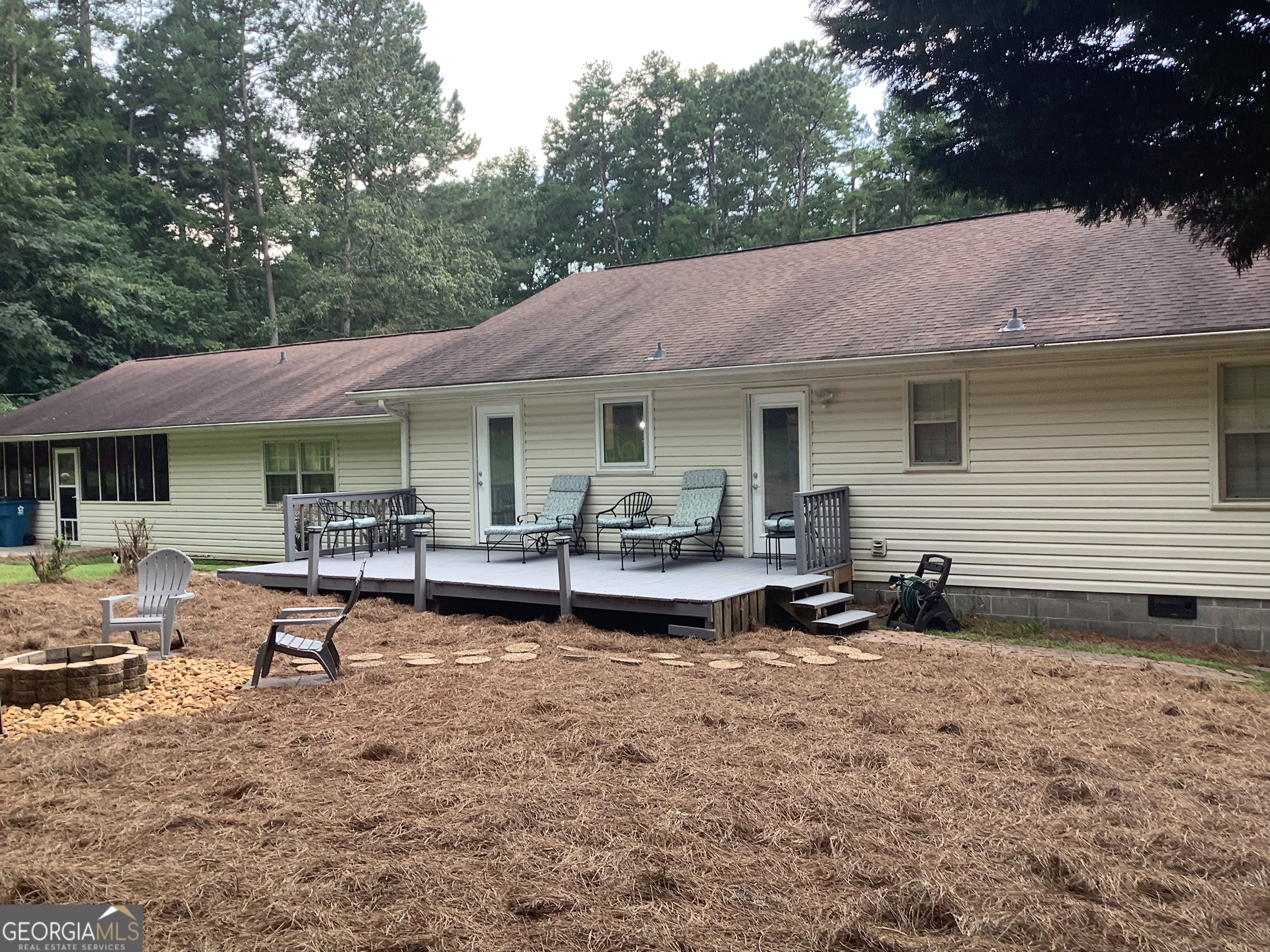 334 Armuchee Trail Northeast Rome, GA 30165 - Photo 11 of 53 a front view of a house with garden