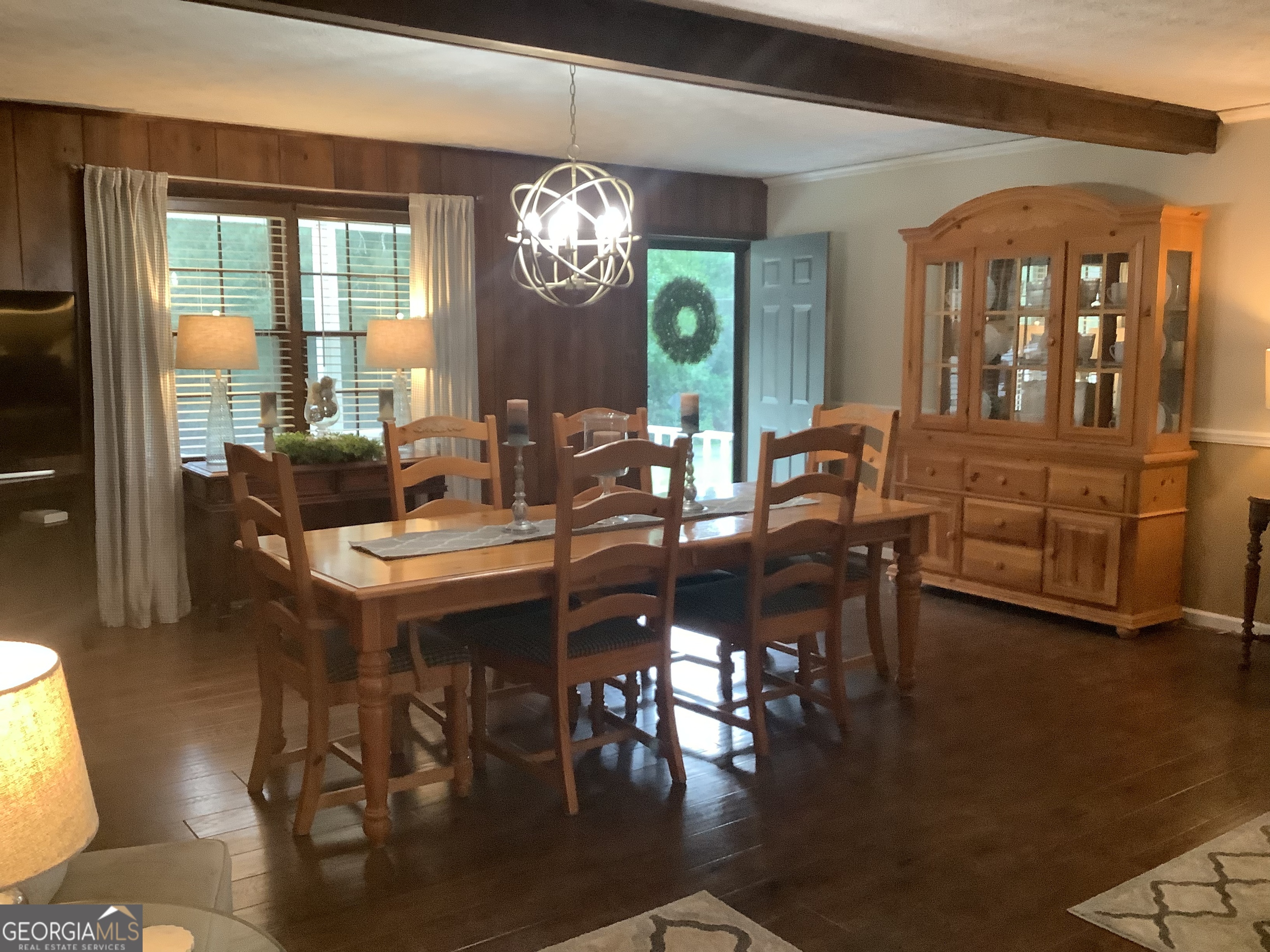 334 Armuchee Trail Northeast Rome, GA 30165 - Photo 12 of 53 a view of a dining room with furniture window and wooden floor