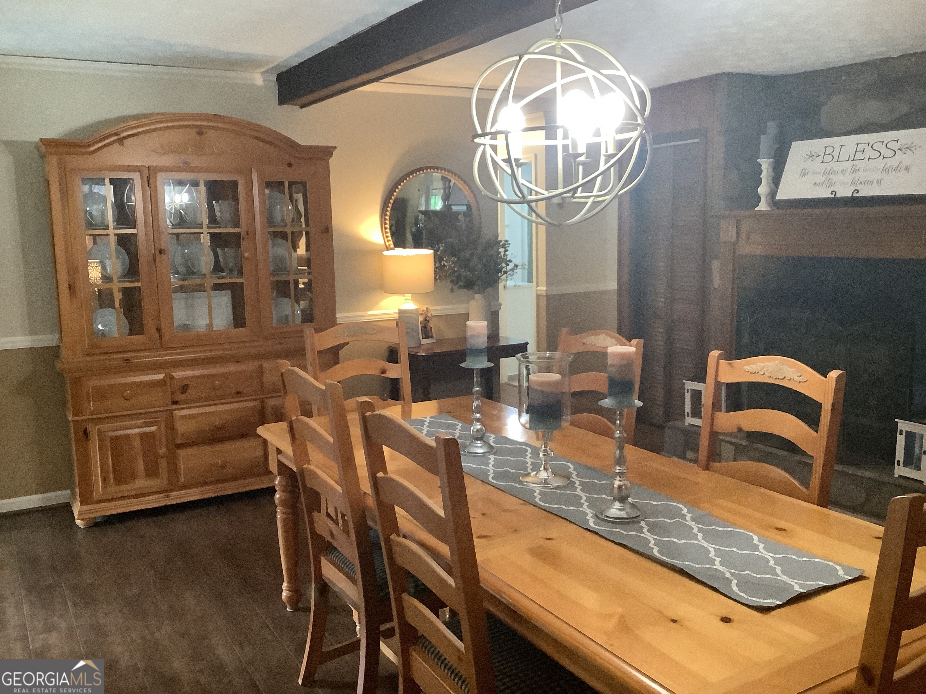 334 Armuchee Trail Northeast Rome, GA 30165 - Photo 13 of 53 a view of a dining room with furniture a chandelier and wooden floor