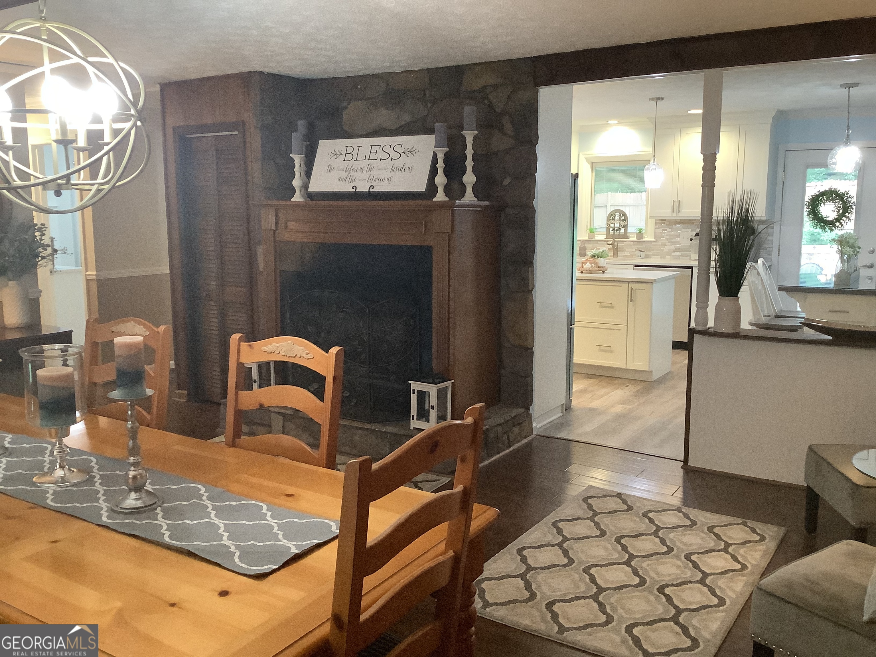 334 Armuchee Trail Northeast Rome, GA 30165 - Photo 14 of 53 a kitchen with a sink and a refrigerator