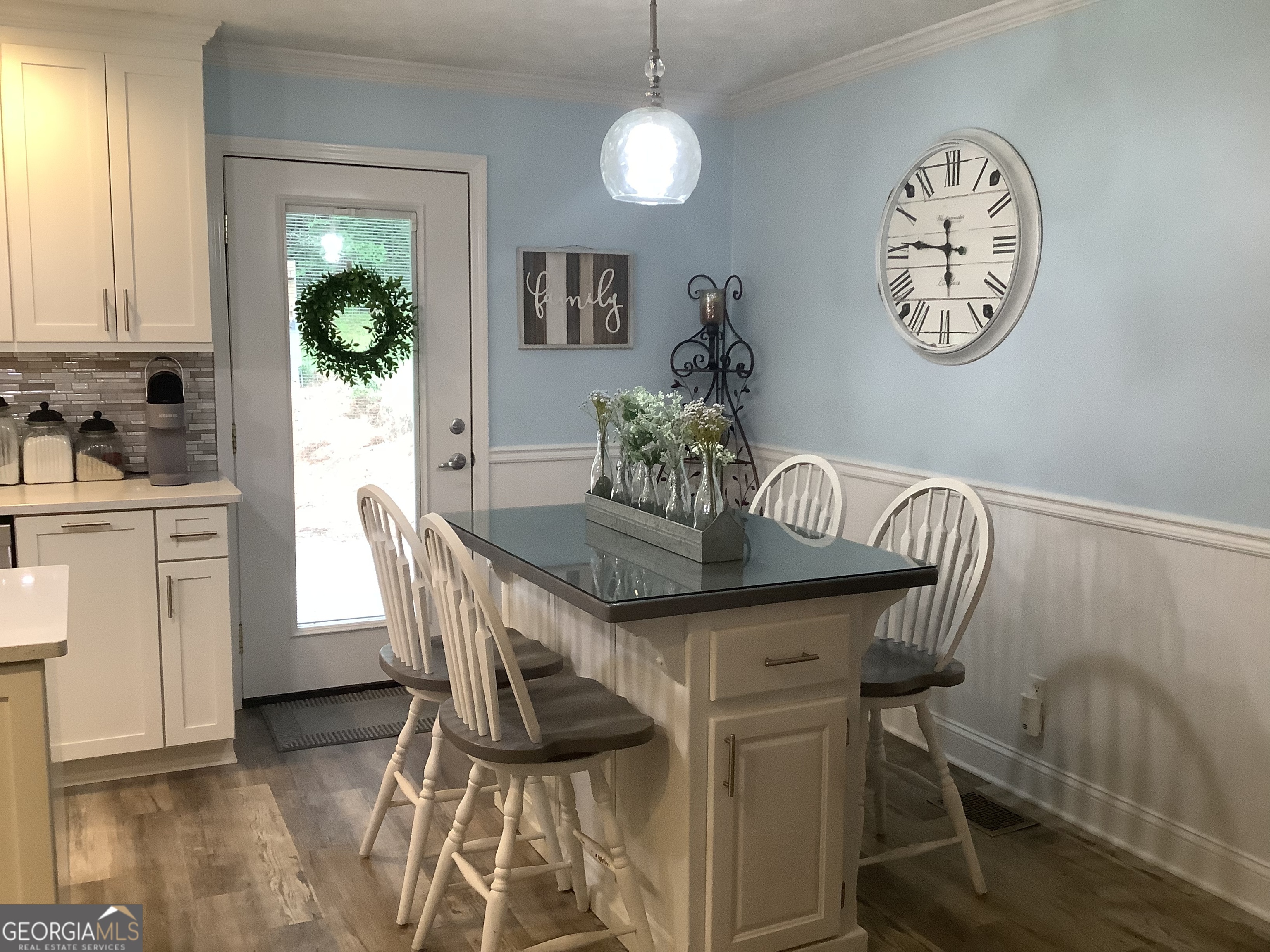 334 Armuchee Trail Northeast Rome, GA 30165 - Photo 18 of 53 a view of a dining room with furniture and a chandelier
