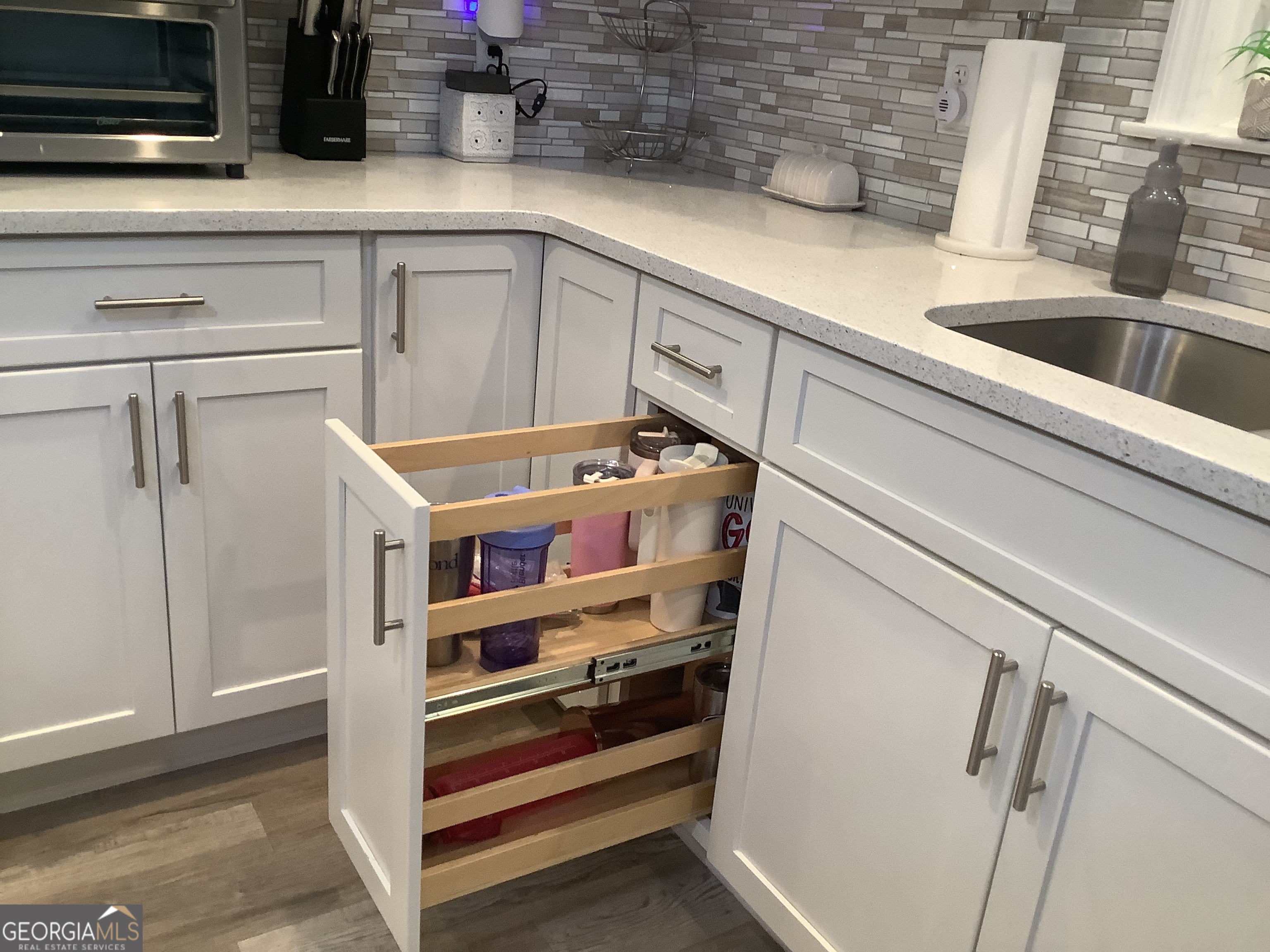334 Armuchee Trail Northeast Rome, GA 30165 - Photo 21 of 53 a kitchen with appliances cabinets and a counter top space