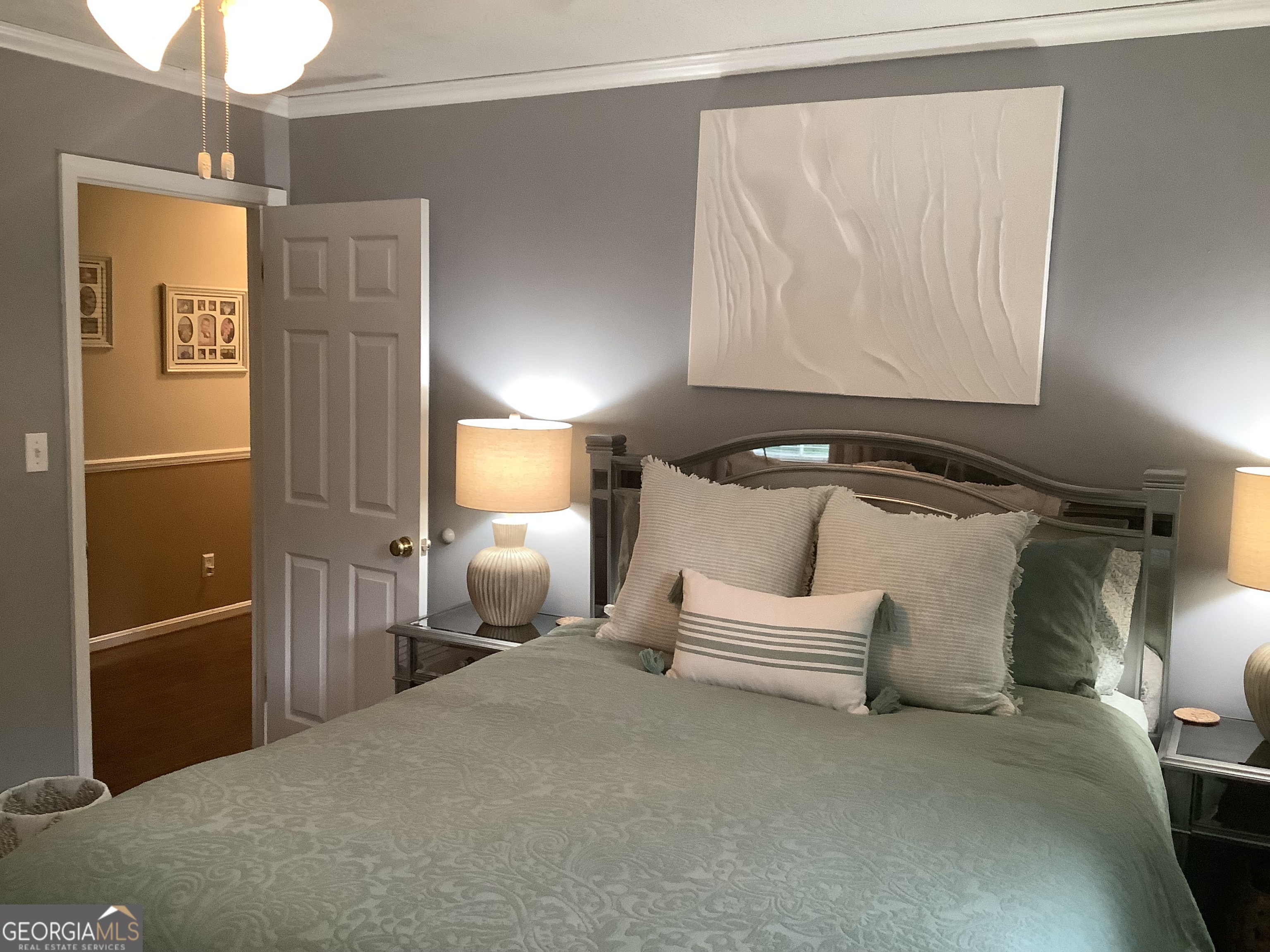 334 Armuchee Trail Northeast Rome, GA 30165 - Photo 34 of 53 a bedroom with a bed and cabinets