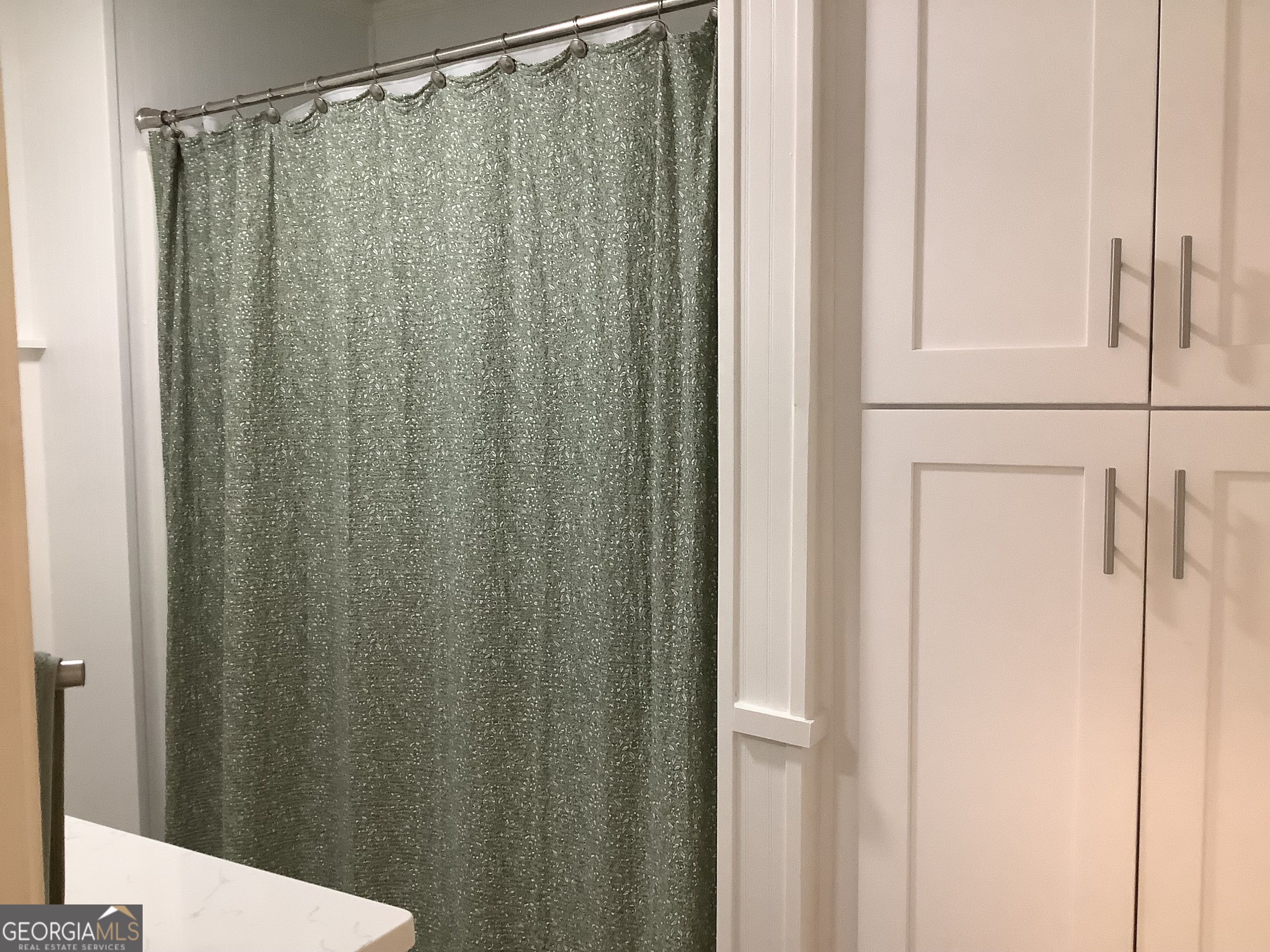 334 Armuchee Trail Northeast Rome, GA 30165 - Photo 38 of 53 a bathroom with a shower and a curtain