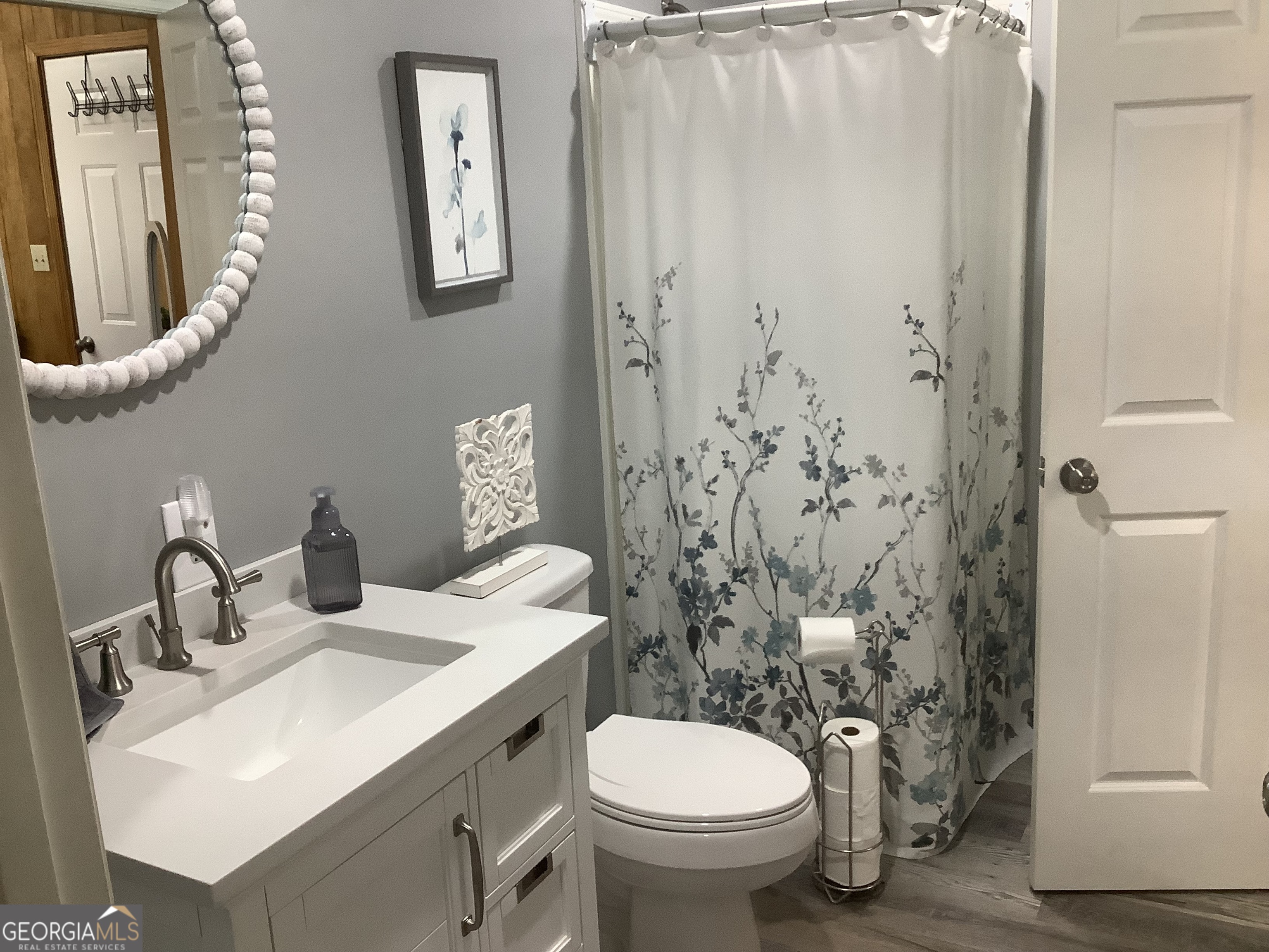 334 Armuchee Trail Northeast Rome, GA 30165 - Photo 46 of 53 a bathroom with a sink toilet and shower