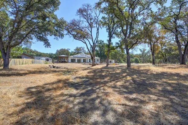 a view of road with trees