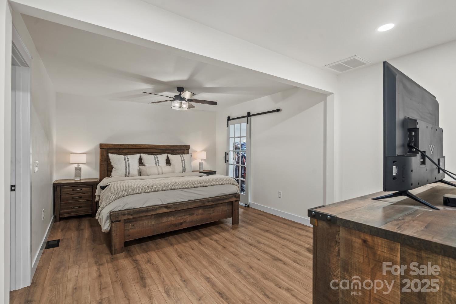 5740 Crouse Road Crouse, NC 28033 - Photo 12 of 28 a bedroom with a bed and a table