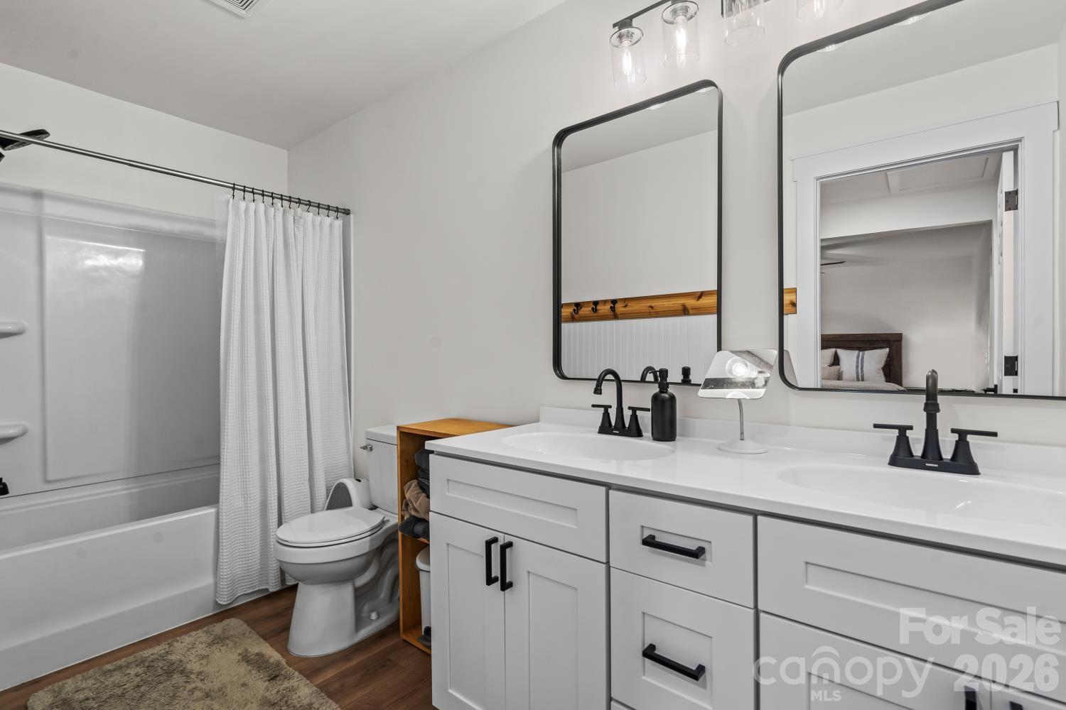 5740 Crouse Road Crouse, NC 28033 - Photo 14 of 28 a bathroom with a sink a toilet and shower