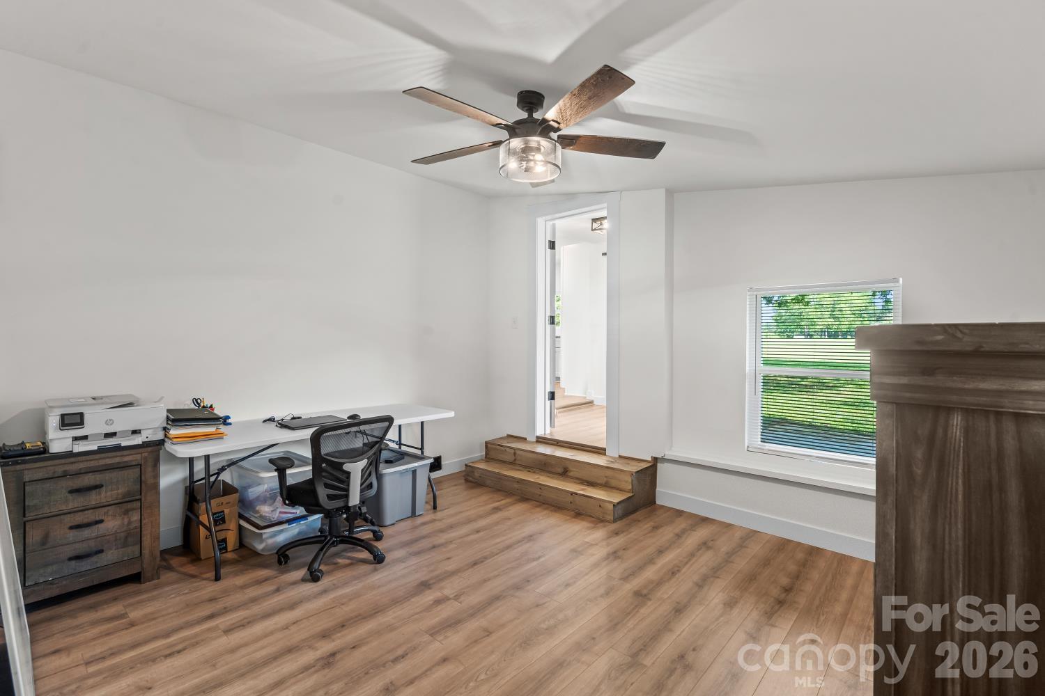 5740 Crouse Road Crouse, NC 28033 - Photo 19 of 28 a view of a livingroom with furniture and hardwood floor