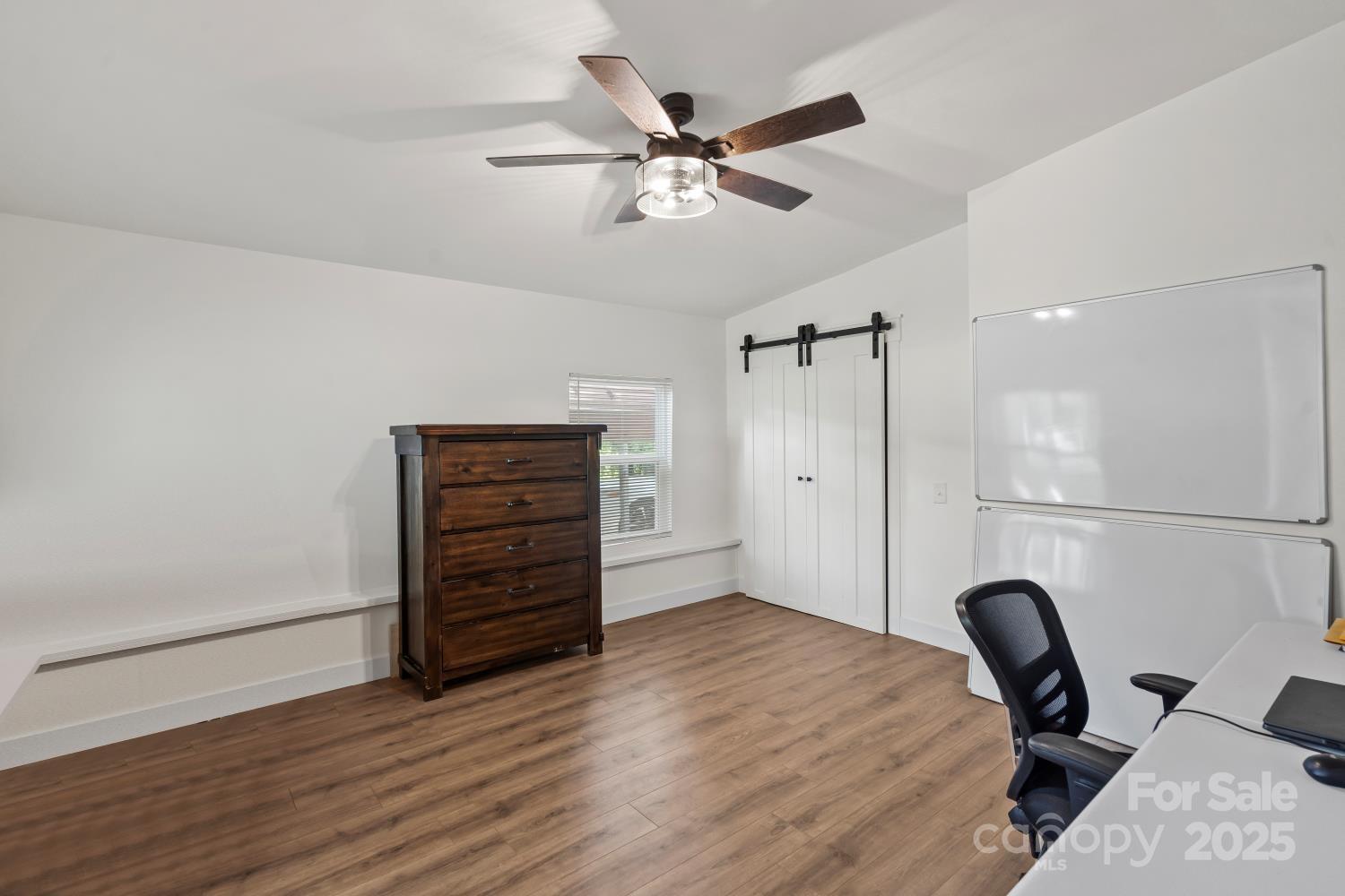 5740 Crouse Road Crouse, NC 28033 - Photo 21 of 28 a view of a workspace with furniture and wooden floor