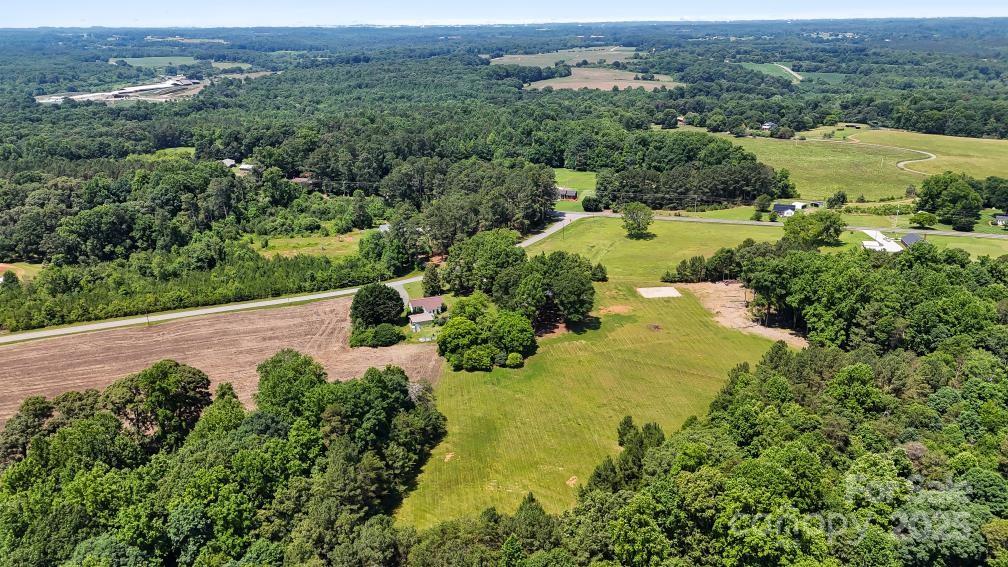 5740 Crouse Road Crouse, NC 28033 - Photo 27 of 28 an aerial view of a houses with yard